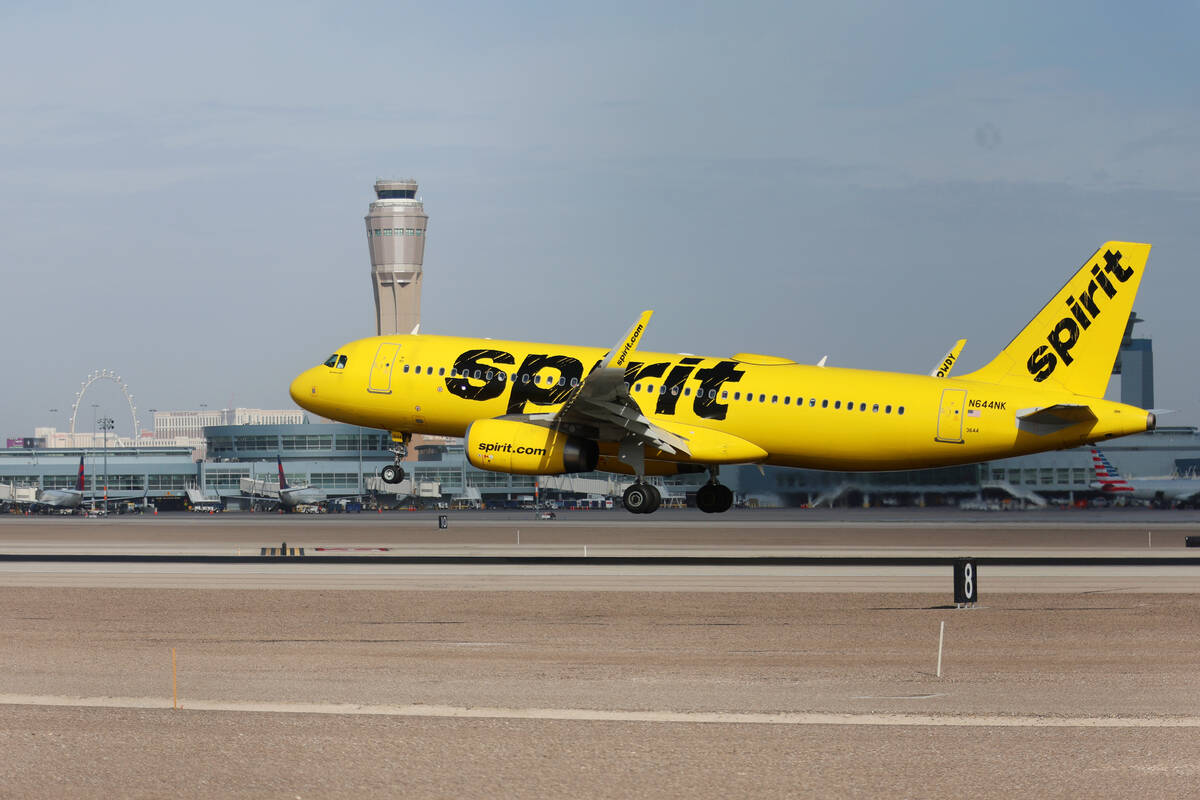 A Spirit Airlines plane arrives to Harry Reid International Airport in Las Vegas, Tuesday, Feb. ...