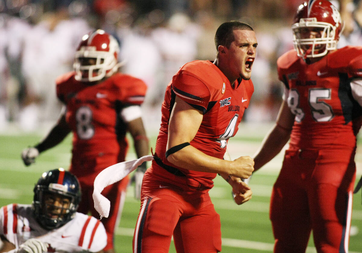 Fresno State's Derek Carr celebrates a touchdown against Mississippi in the second half of an N ...