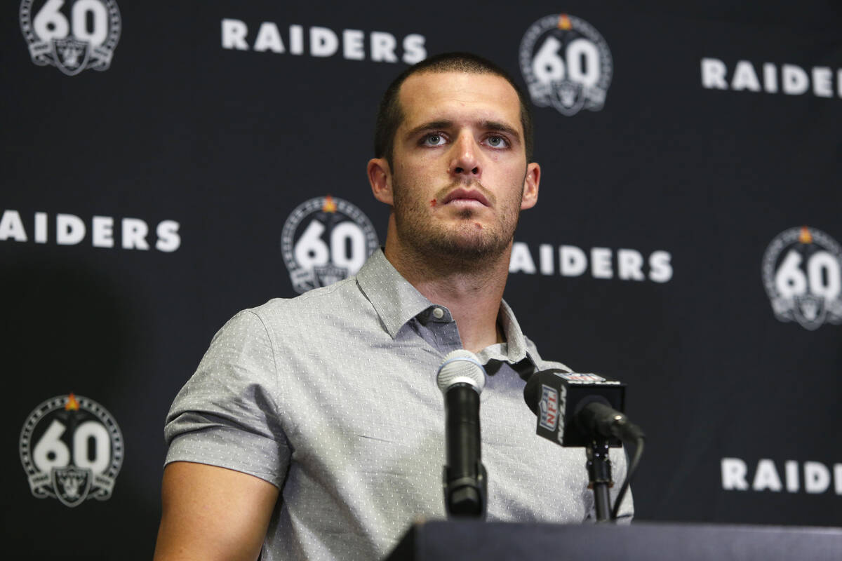 Oakland Raiders quarterback Derek Carr speaks during a news conference after an NFL football ga ...