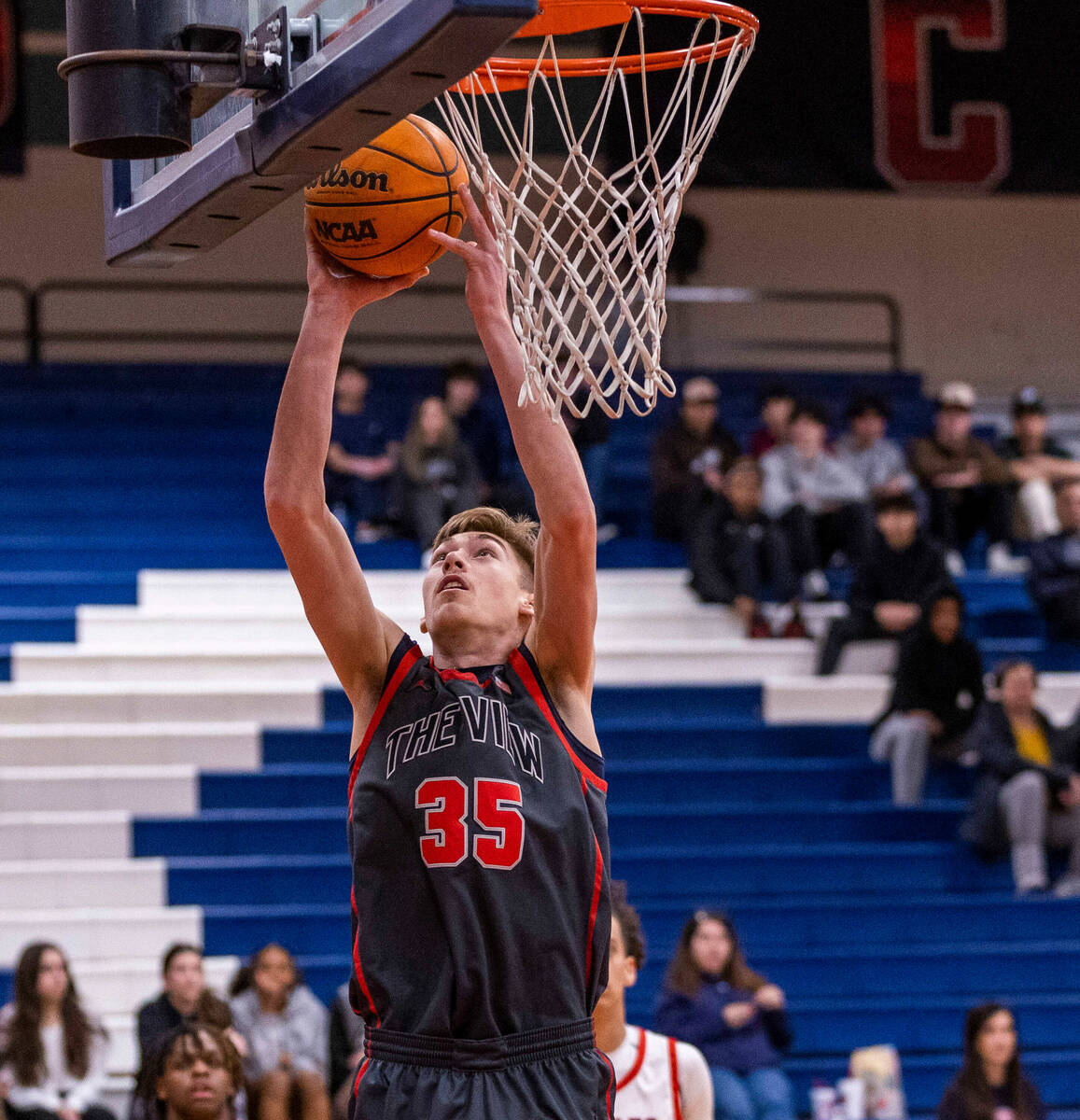Arbor View's Wyatt Jaeck (35) lays up the ball against Coronado during the first half of their ...