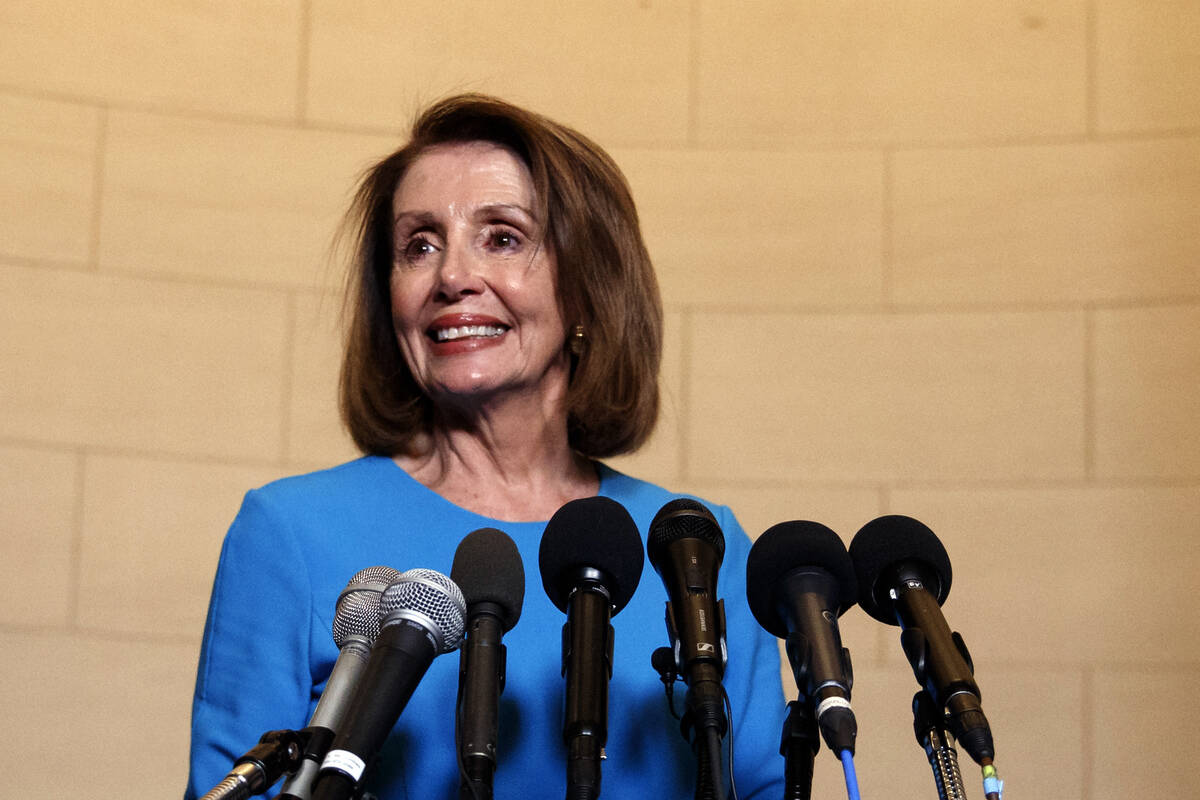 House Minority Leader Nancy Pelosi, D-Calif., arrives to speak to media at Longworth House Offi ...