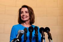 House Minority Leader Nancy Pelosi, D-Calif., arrives to speak to media at Longworth House Offi ...