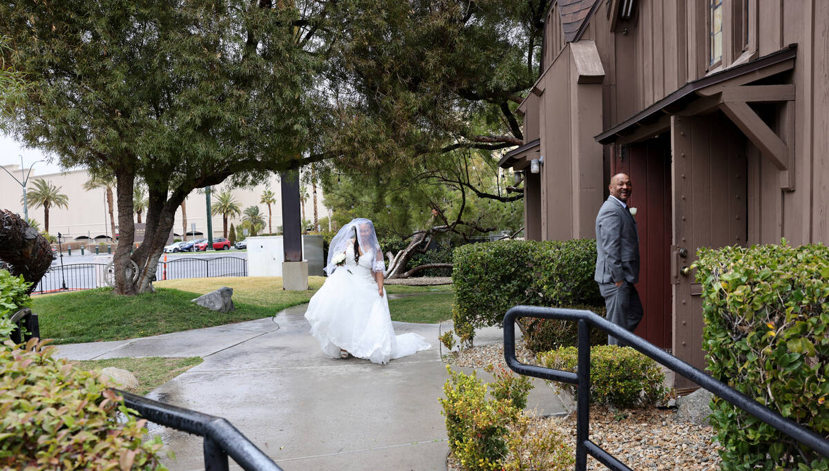 Newlyweds Dytanya Hall and Contessa Lee of Phoenix are seen at Little Church of the West Weddin ...