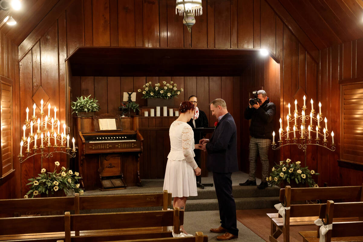 Laura Brown and Richard Draper of England are seen at Little Church of the West Wedding Chapel ...