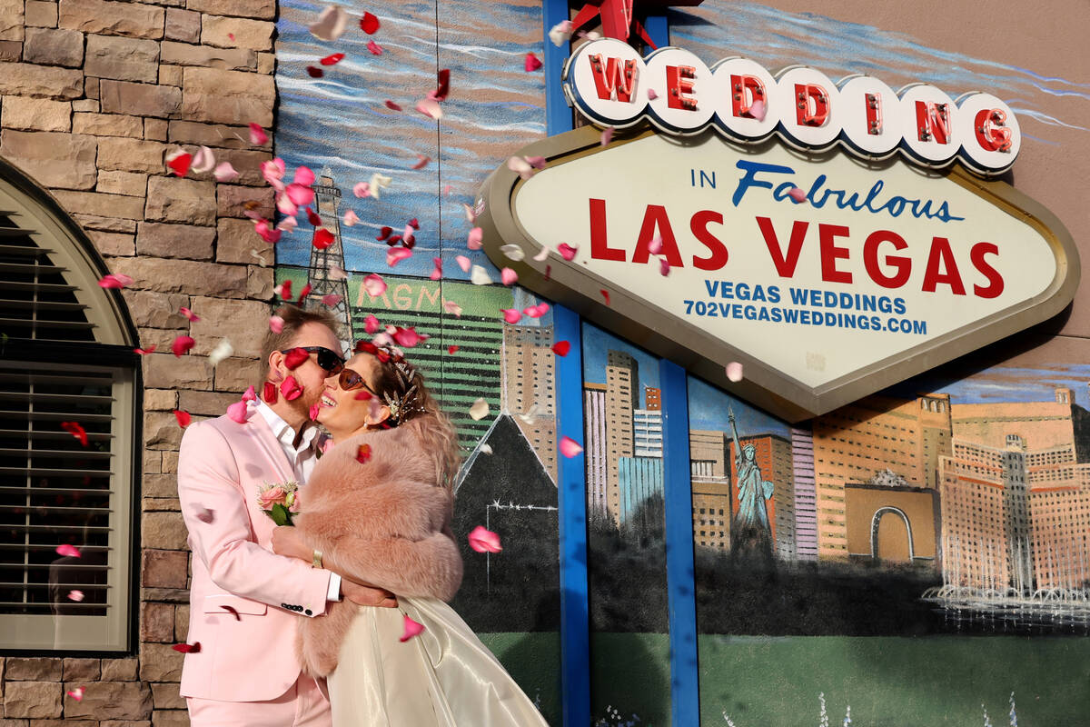 Tomasz Lindenberg and Anna Lacka of Poland are seen after getting married at Vegas Weddings cha ...
