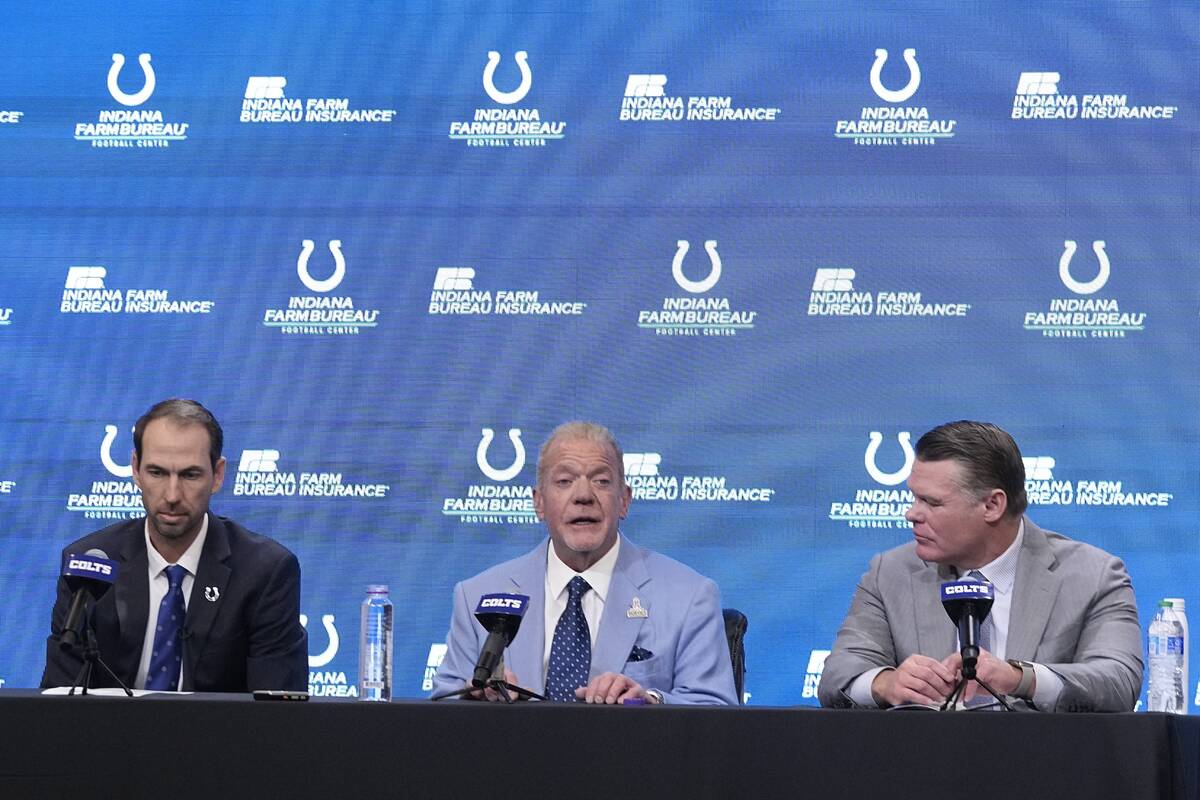Indianapolis Colts owner Jim Irsay, middle, speaks as Shane Steichen, left, and Indianapolis Co ...