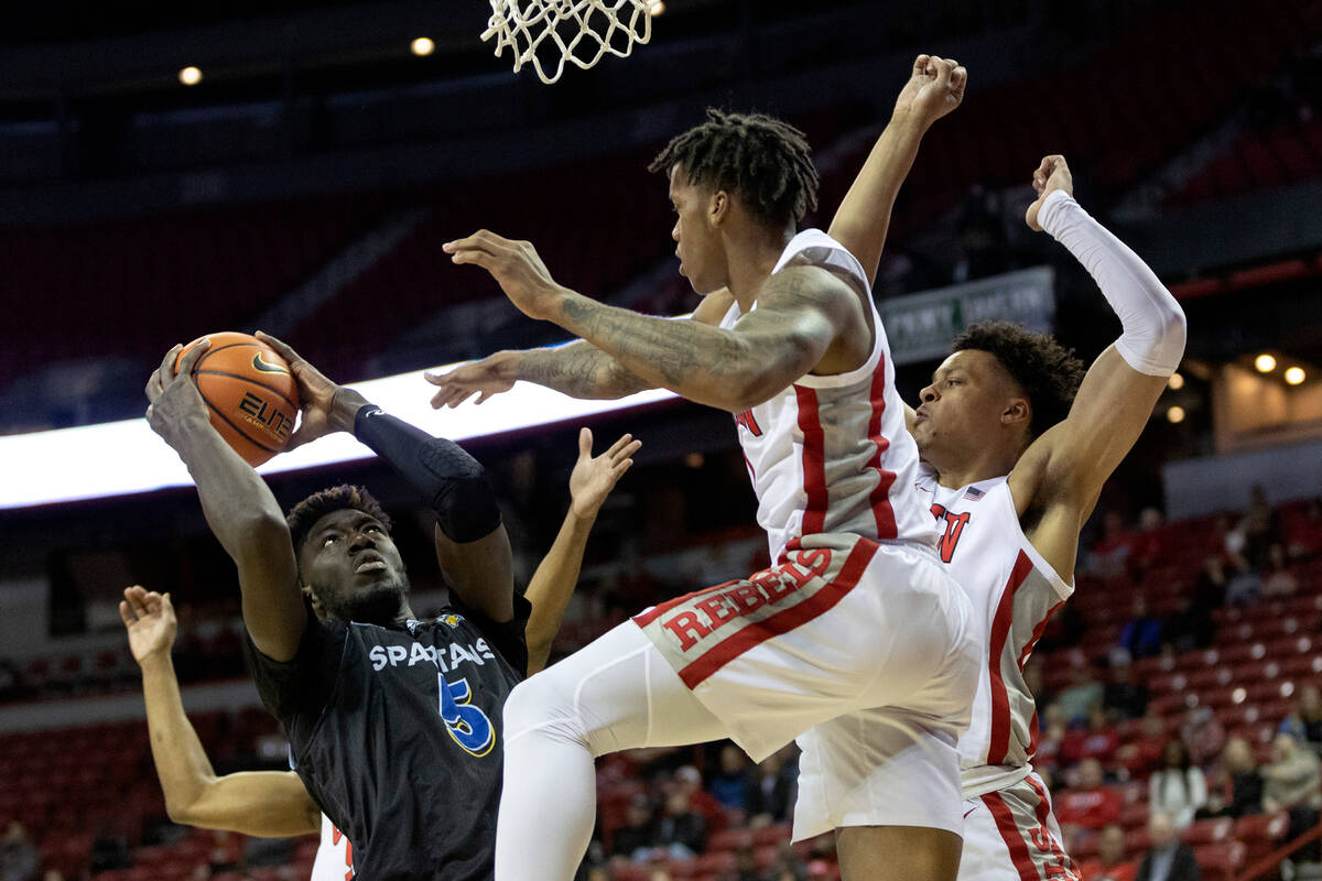 San Jose State Spartans center Ibrahima Diallo (5) shoots against UNLV Rebels guard Elijah Parq ...