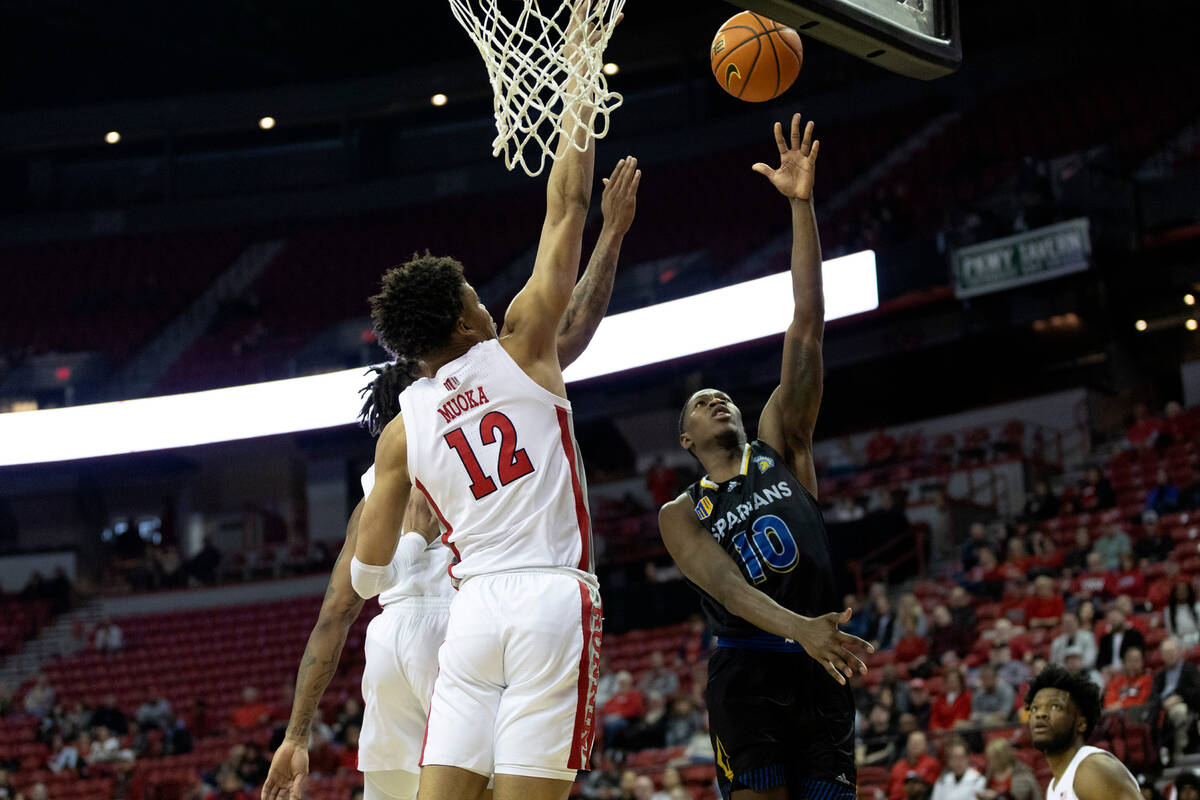 San Jose State Spartans guard Omari Moore (10) shoots against UNLV Rebels center David Muoka (1 ...