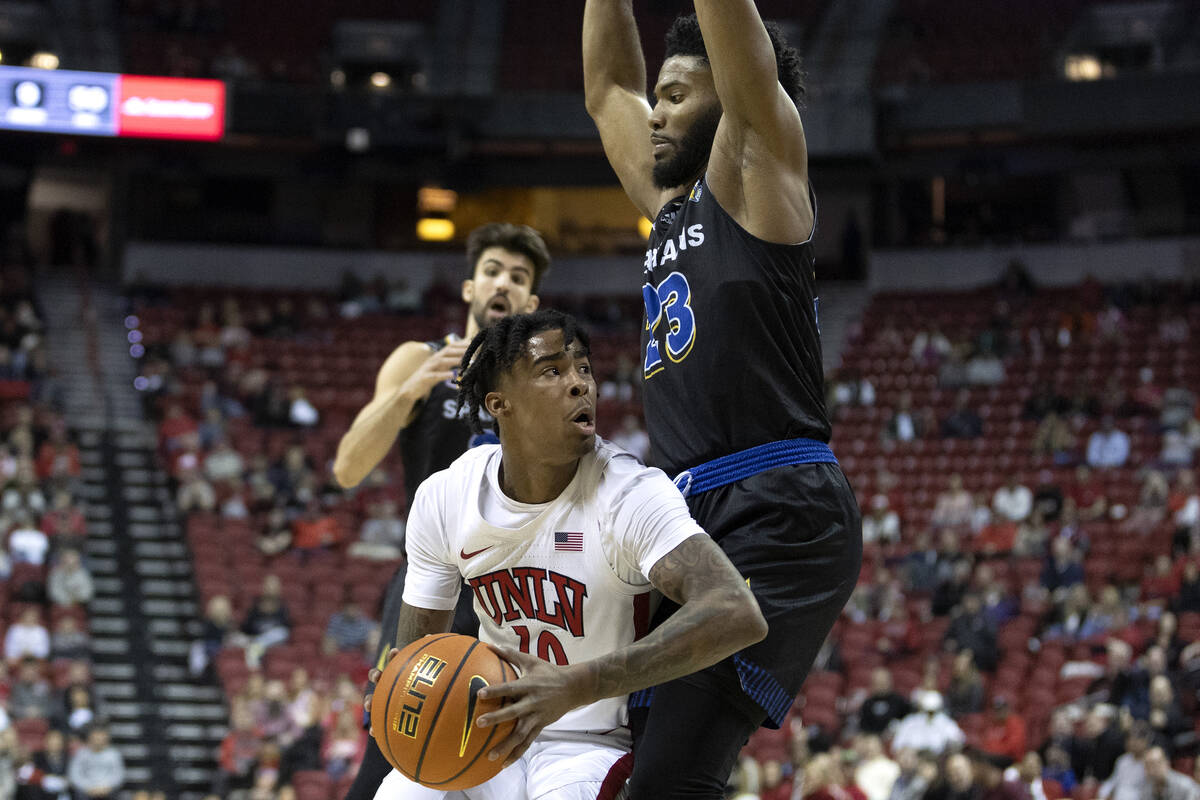 UNLV Rebels guard Keshon Gilbert (10) drives toward the hoop against San Jose State Spartans fo ...