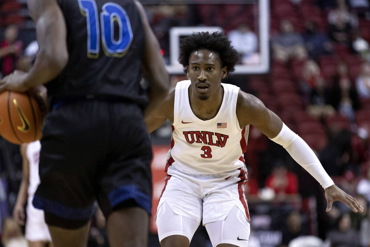 UNLV Rebels guard Shane Nowell (3) defends against San Jose State Spartans guard Omari Moore (1 ...