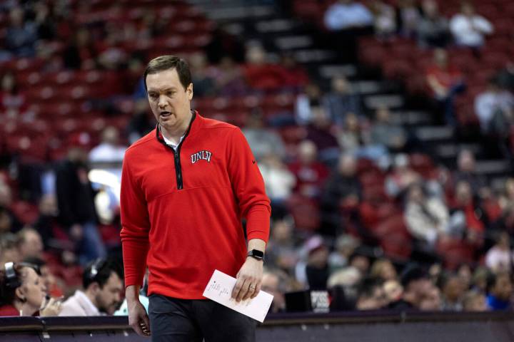 UNLV Rebels head coach Kevin Kruger paces the sidelines during the first half of an NCAA colleg ...