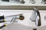 Updating bathroom faucet, sink stopper ring takes 1-2 hours