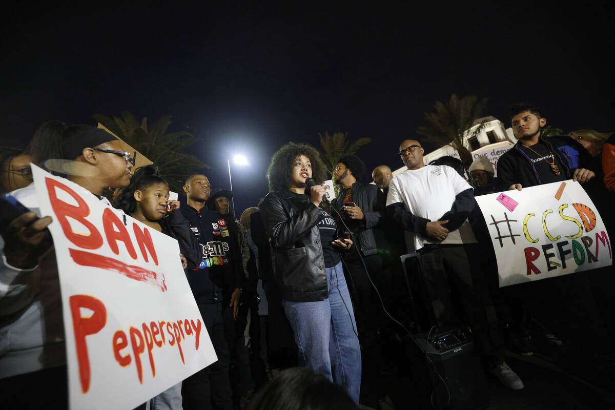 Nevada State High School 12th grader Rebecca Haile, 18, center, speaks during a rally outside t ...