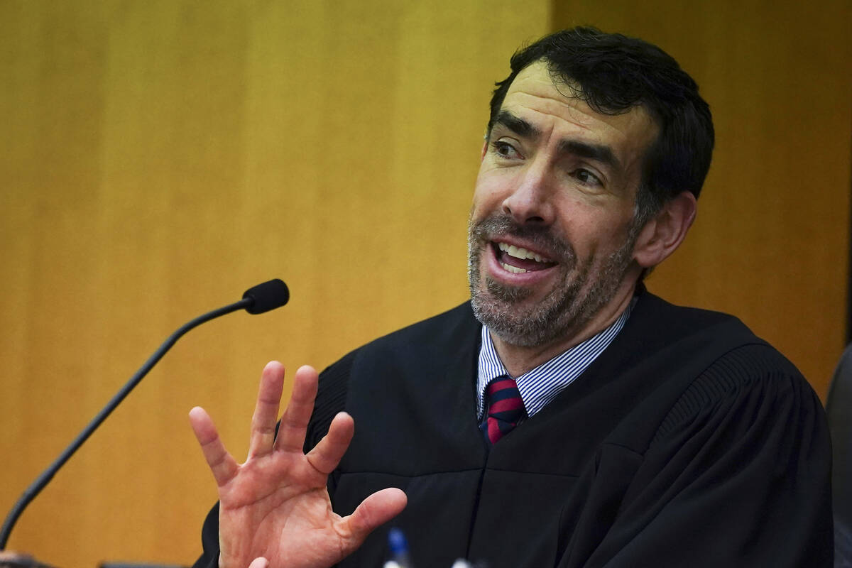 FILE - Fulton County Superior Court Judge Robert McBurney speaks during a hearing to decide if ...