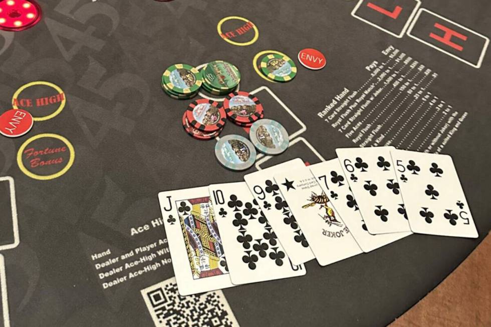 A local player drew a seven-card flush on pai gow poker to win more than $166,000 on Tuesday, F ...