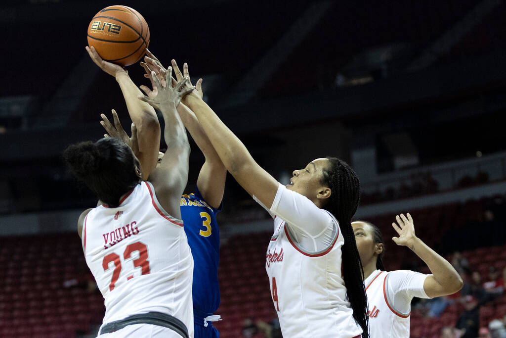 UNLV Lady Rebels center Desi-Rae Young (23), San José State Spartans forward Nailea Nichol ...