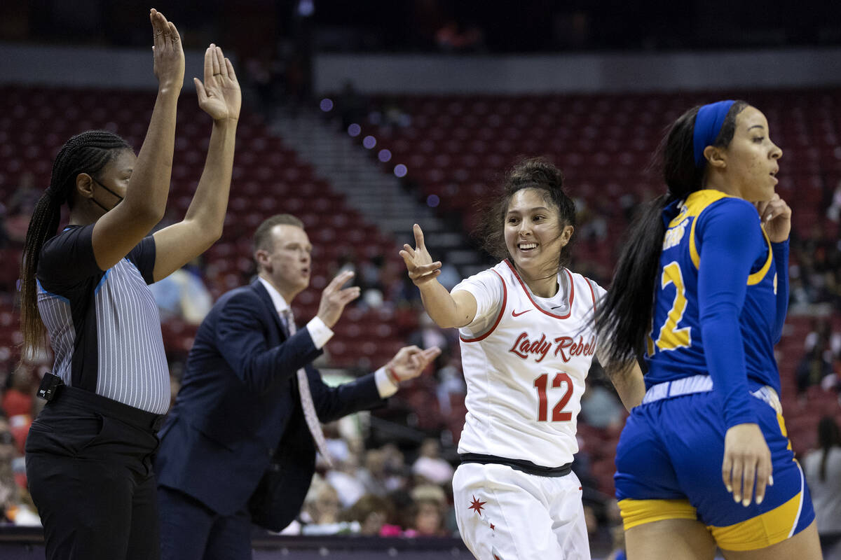 UNLV Lady Rebels guard Alyssa Durazo-Frescas (12) celebrates after scoring a three-pointer duri ...