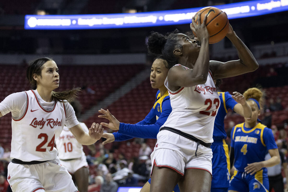 UNLV Lady Rebels center Desi-Rae Young (23) shoots around San José State Spartans guard Si ...