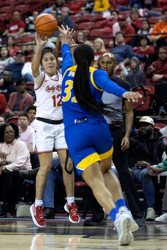 UNLV Lady Rebels guard Alyssa Durazo-Frescas (12) shoots a three-pointer against San José ...