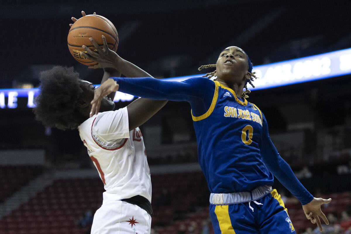 UNLV Lady Rebels guard Jasmyn Lott (10) shoots against San José State Spartans guard Aario ...