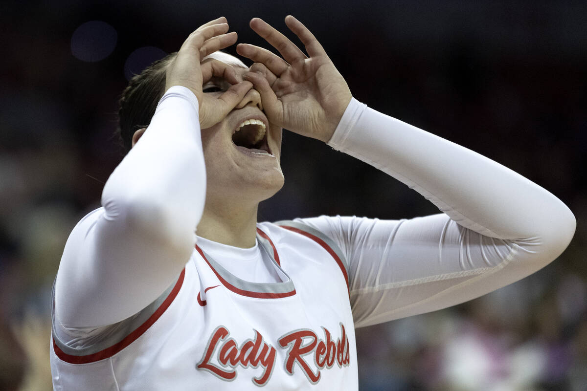 UNLV Lady Rebels center Erica Collins (31) celebrates after Lady Rebels guard Alyssa Durazo-Fre ...