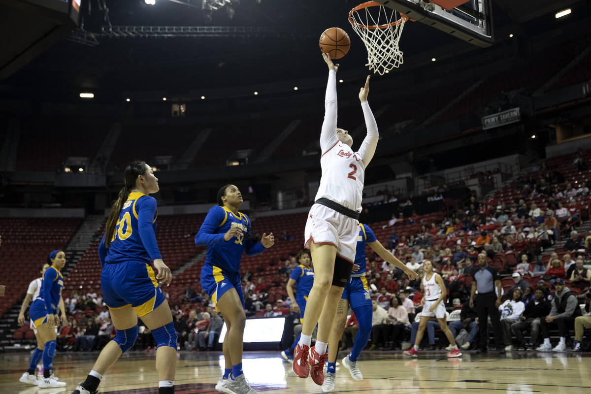 UNLV Lady Rebels guard Kenadee Winfrey (2) shoots after breaking away with the ball during the ...