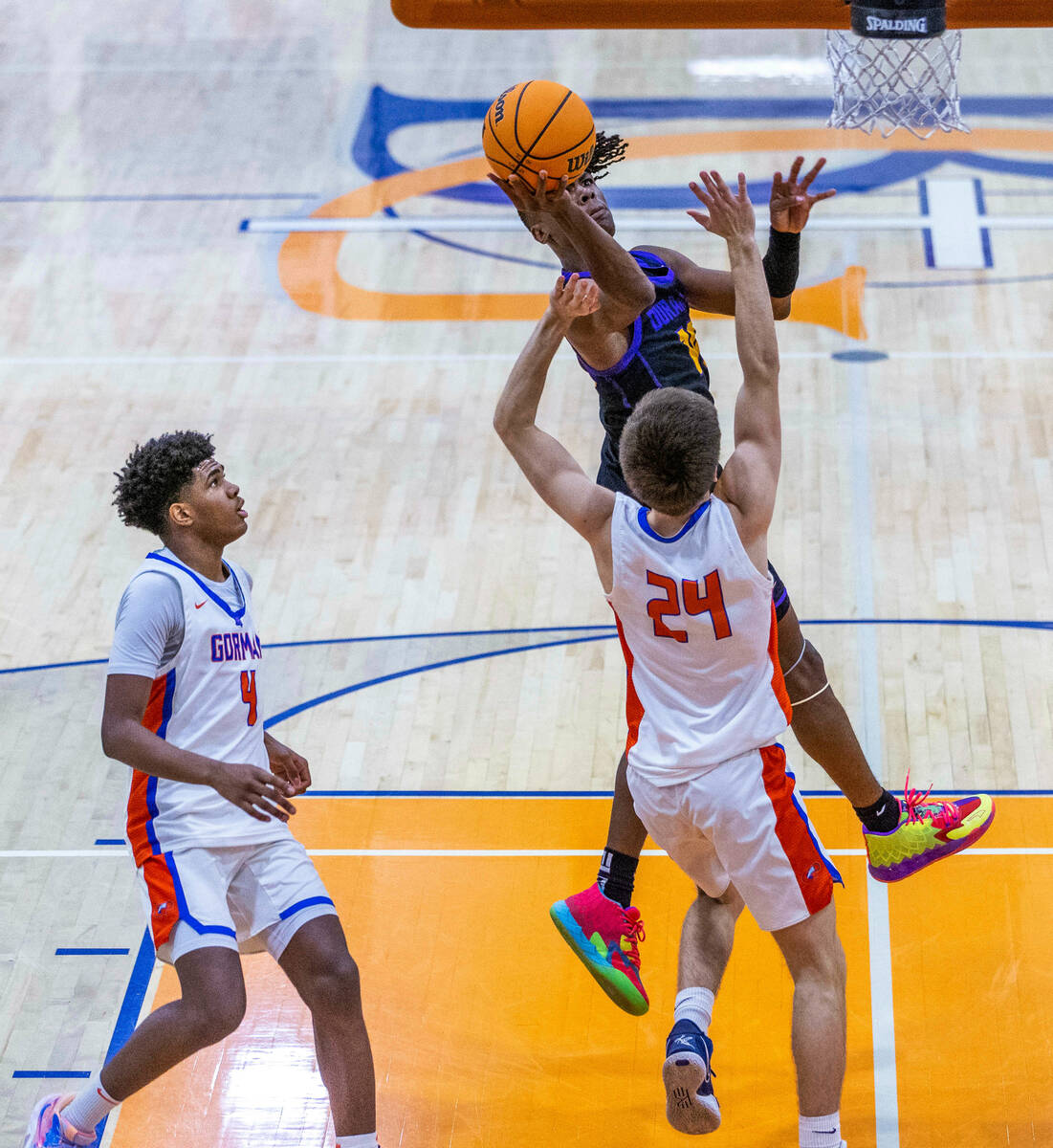 Durango's Tylen Riley (10) goes high to lay the ball in over Bishop Gorman's Ryder Elisaldez ( ...