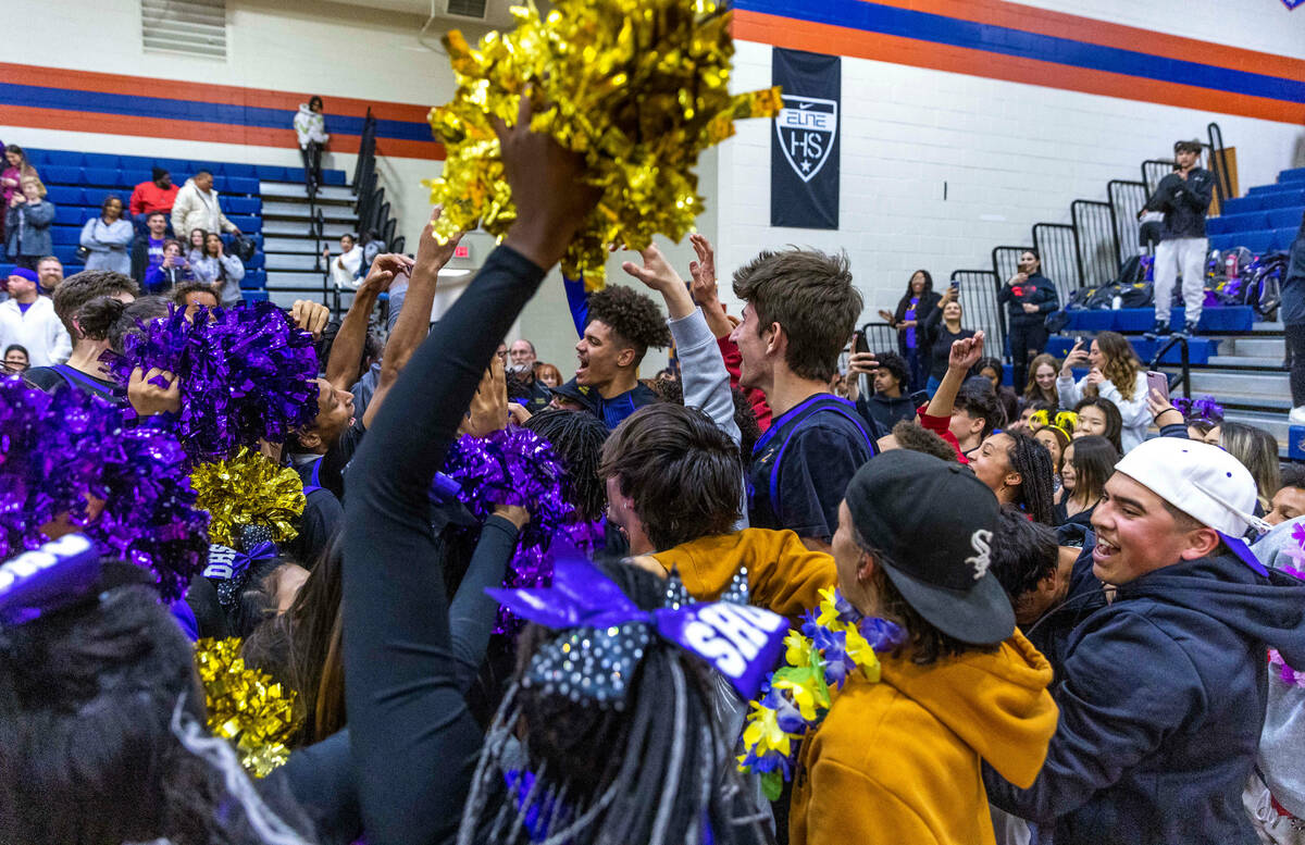 Durango players, cheerleaders and fans celebrate after defeating Bishop Gorman following the se ...