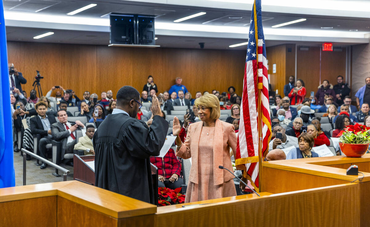 North Las Vegas Mayor Pamela Goynes-Brown, center, is inaugurated by Judge Courtney Ketter beco ...