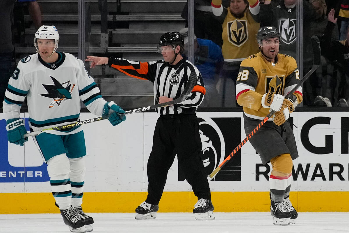 Vegas Golden Knights left wing William Carrier, right, celebrates after scoring against the San ...