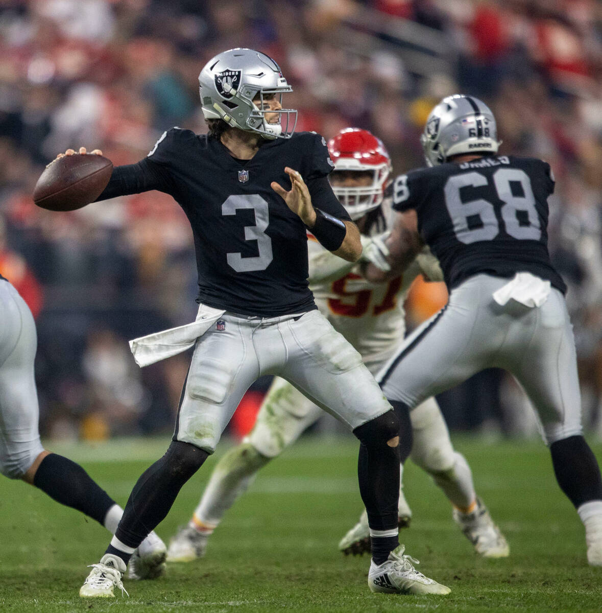 Raiders quarterback Jarrett Stidham (3) throws against the Kansas City Chiefs during the second ...