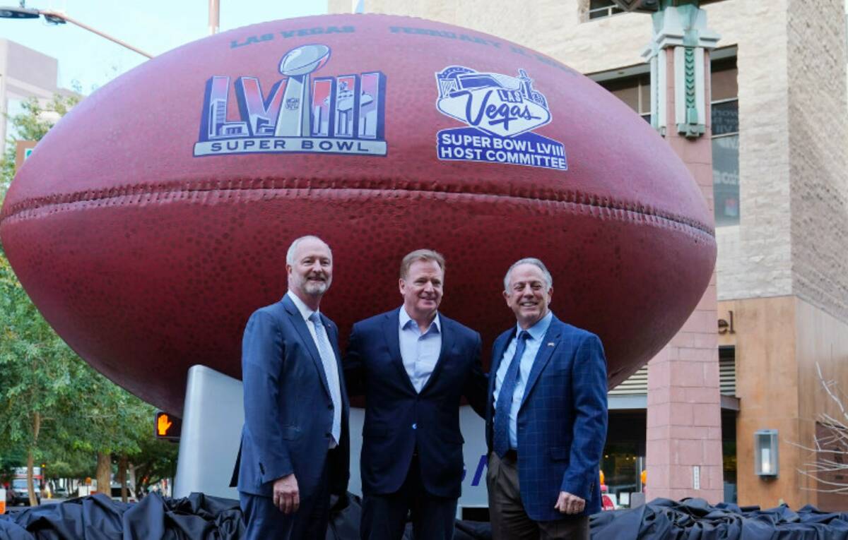 NFL Commissioner Roger Goodell is flanked by Steve Hill, left, Las Vegas Super Bowl LVIII Host ...