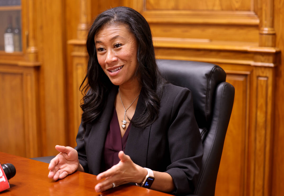 Nevada Supreme Court Justice Patricia Lee talks to a reporter at the Supreme Court building in ...