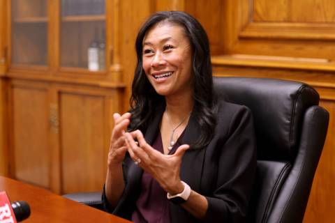 Nevada Supreme Court Justice Patricia Lee talks to a reporter at the Supreme Court building in ...
