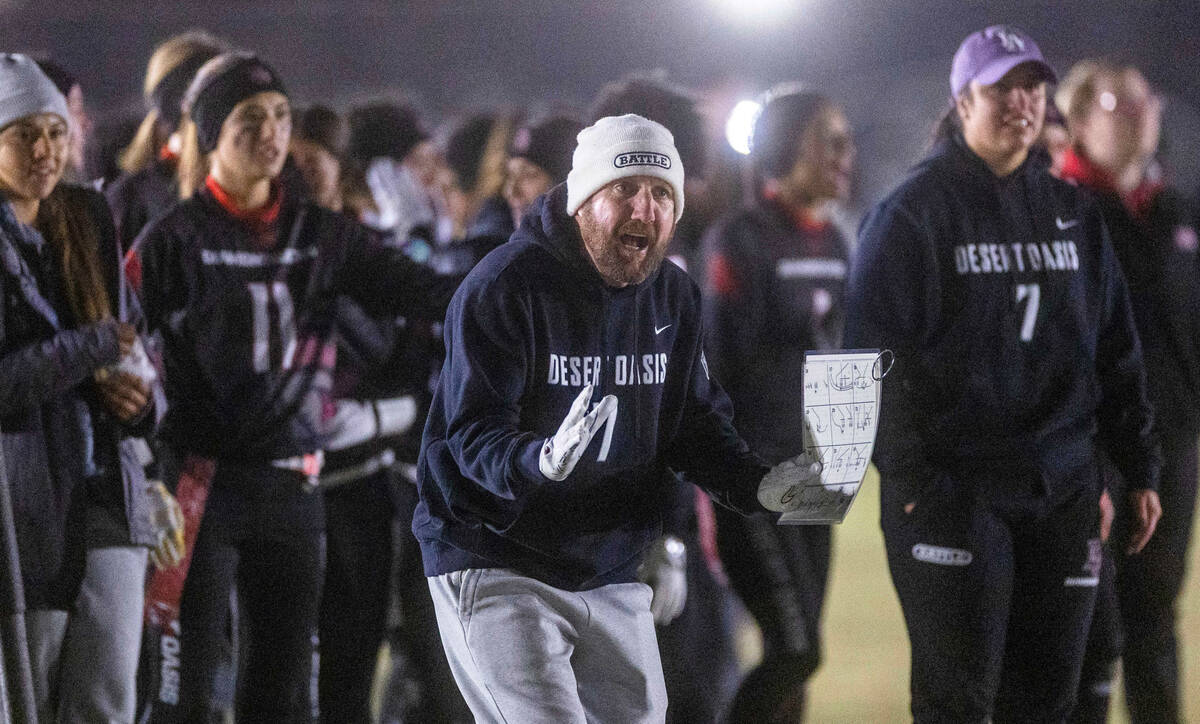 Desert Oasis Head Coach Todd Thomson yells to his players against Legacy during the first half ...