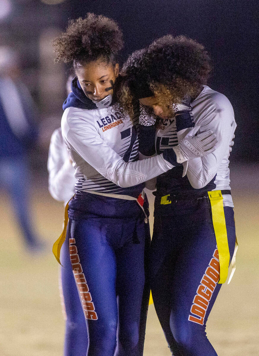 Legacy's Giselle Washington (5) is comforted by teammate Amaya Stepp (7) after a failed recepti ...