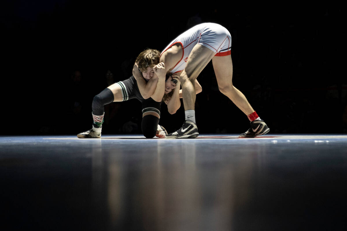 Western’s Colby Sullivan wrestles Arbor View’s Robert Ortega in the 106 lb weight ...