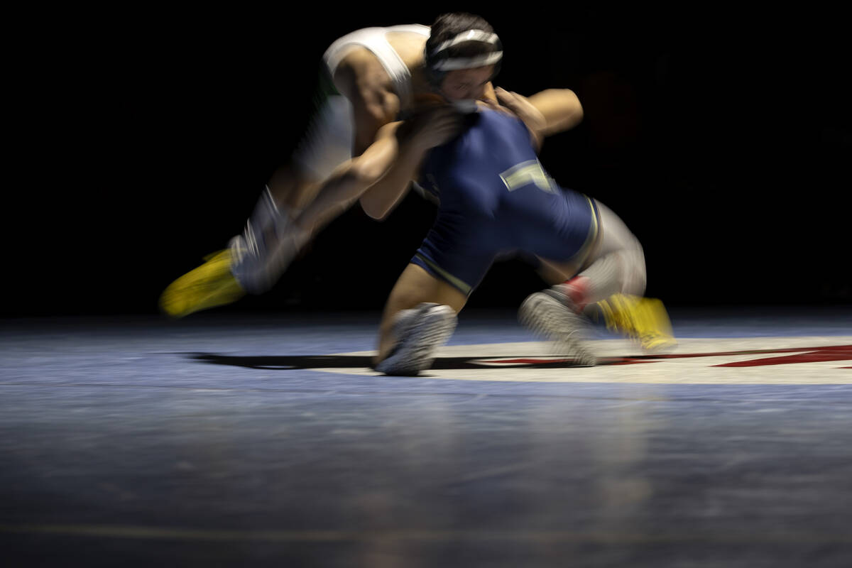 Rancho’s Caleb LeBaron and Cheyenne’s Matthew Salvador wrestle in the 120 lb weig ...