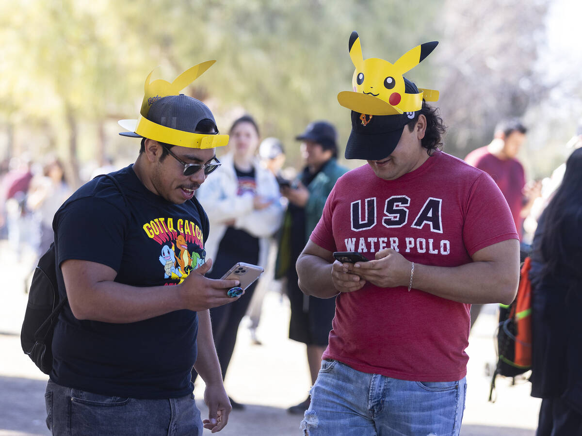Victor Gonzales, left, and Angel Servin, both of San Bernardino, Calif., navigate Sunset Park w ...