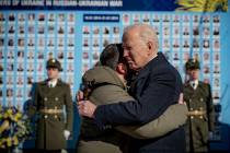 President Joe Biden, right, and Ukrainian President Volodymyr Zelenskyy hug as they say goodbye ...