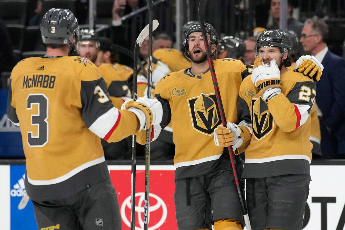 Vegas Golden Knights center Nicolas Roy, center, celebrates after scoring against the Tampa Bay ...