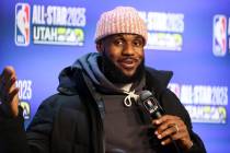 Western Conference All-Star LeBron James of the Los Angeles Lakers answers questions at a news ...