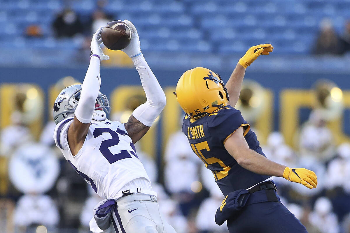 Kansas State cornerback Julius Brents (23) intercepts a pass intended for West Virginia wide re ...