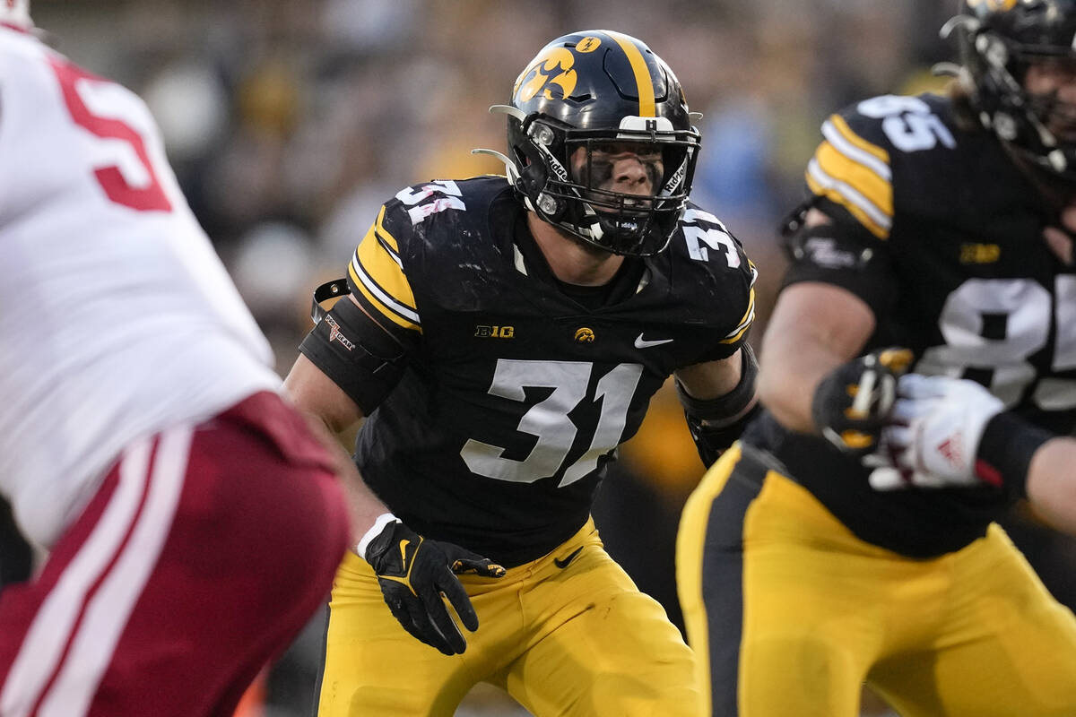 Iowa linebacker Jack Campbell (31) gets set for a play during the first half of an NCAA college ...