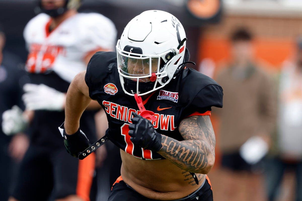 National linebacker Ivan Pace Jr of Cincinnati runs through drills during practice for the Seni ...