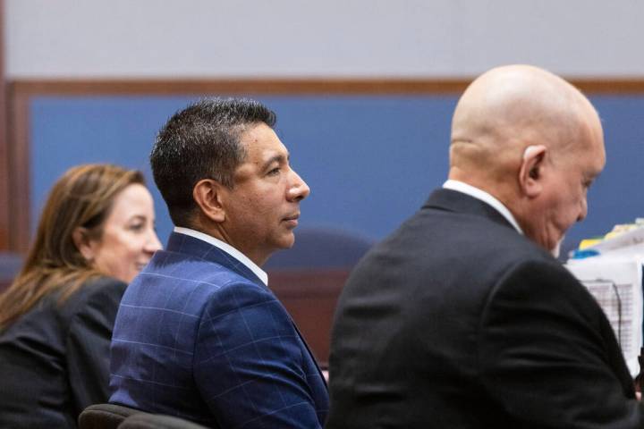 Adolfo Orozco, center, owner of the Alpine Apartments, charged with six counts of involuntary m ...