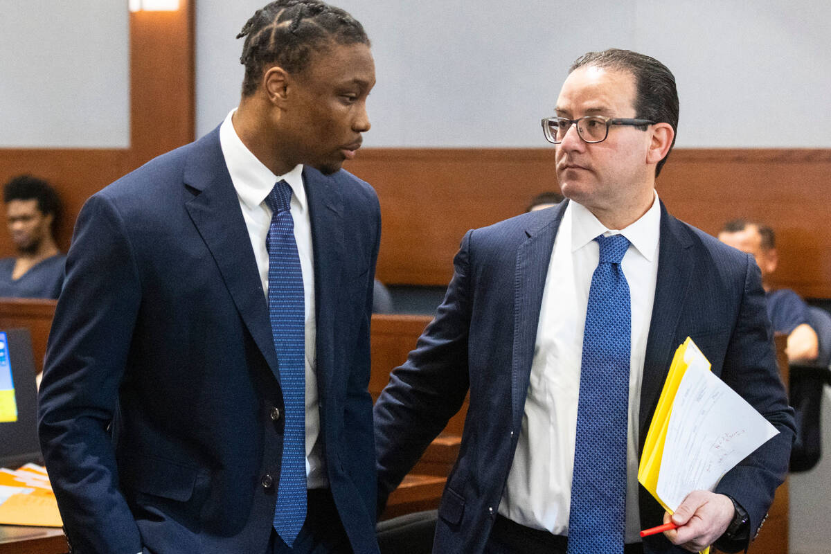 Ex-Raiders wide receiver Henry Ruggs, left, leaves the courtroom with his attorney Richard Scho ...