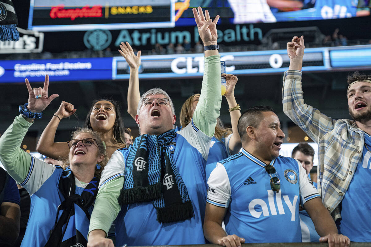 Fans cheer before an MLS soccer match between the Charlotte FC and the LA Galaxy in Charlotte, ...