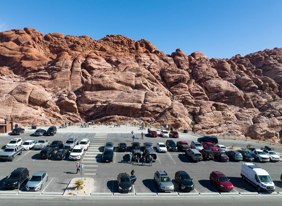 Tourists park their cars at the Calico 1 stop along the scenic route to visit the Red Rock Cany ...