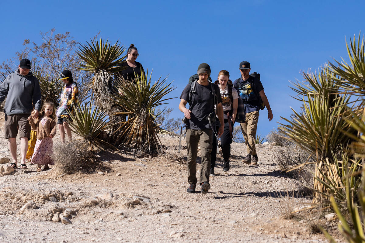 Tourists hike along the scenic route at the Red Rock Canyon National Conservation, on Monday, F ...